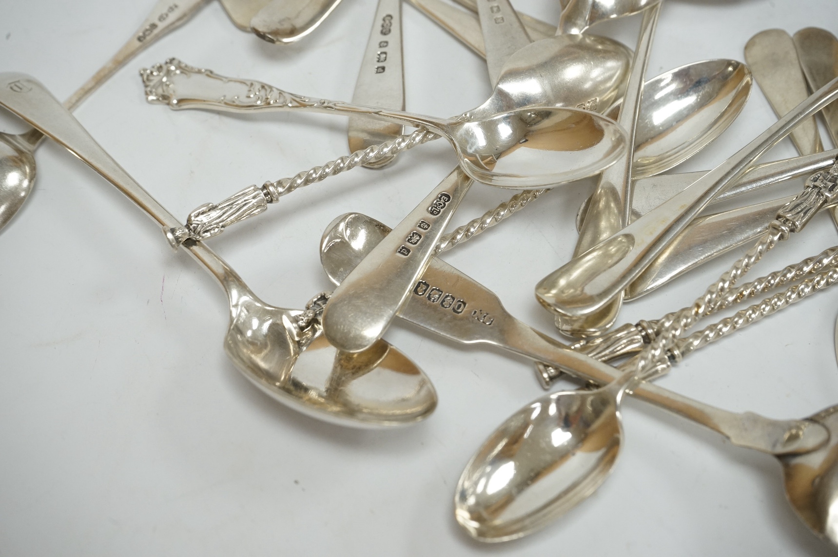 A set of six Edwardian silver coffee spoons, by John Round, Sheffield, 1903 and a small group of other assorted silver tea and coffee spoons, 13.9oz and one plated teaspoon. Condition - fair to good